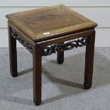 A Chinese square hardwood low table with carved frieze, width 19", height 21"