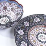 A Persian enamelled metal bowl of lobed circular form, diameter 18cm, and a similar dish, diameter