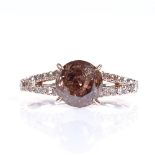 A 14ct rose gold 1.51ct solitaire fancy orangy brown diamond ring, with diamond set shoulders, total