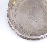 A large circular silver wine coaster, commemorating the marriage of His Royal Highness The Prince