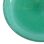 A heavy green handmade soda glass dish, diameter 24cm