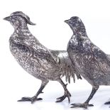 A pair of sterling silver table model pheasants, with relief embossed and engraved bodies, import