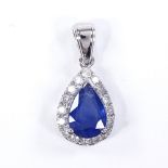 A 14ct white gold sapphire and diamond cluster pendant, pear-cut sapphire approx 0.96ct, total