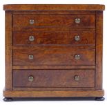 A Victorian walnut apprentice chest of drawers, with brass handles and ebony feet, width 17.5cm,