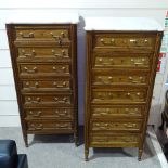 A pair of French mahogany tall chests of 7 drawers, with shaped marble tops, panelled drawer