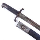 A sword bayonet for an Enfield rifle, original leather and steel-mounted scabbard