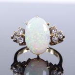 An 18ct gold opal and diamond trio ring, maker's marks KSK, hallmarks London 1987, setting height