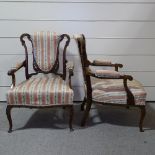 A pair of Victorian walnut-framed fireside armchairs