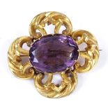 A Victorian amethyst gilt-metal brooch, with pierced foliate settings, brooch length 45.8mm, 17.1g