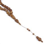A string of Middle Eastern kuka beads