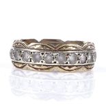 A 9ct gold paste eternity ring, with engraved settings, band width 5.7mm, size J, 2.4g