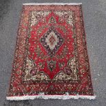 A Persian hand knotted Tabriz circa mid-20th century, 6'7" x 4'6"