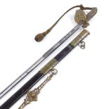 An Edward VII Navy dress sword by E Goldman of Devonport, with etched blade, brass bowl hilt with