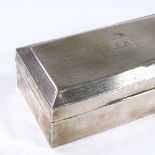 A George V rectangular silver cigarette box, with engine turned lid, by F H Adams & Co, hallmarks