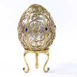 A Theo Faberge style St Petersburg Collection Egg - Emergence of Spring, silver and enamel egg,