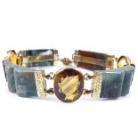 A Scottish unmarked yellow metal citrine and hardstone panel bracelet, set with bloodstones and