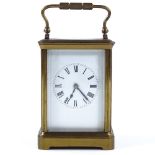 A French 8-day brass-cased carriage clock, striking on a gong, case height 13cm