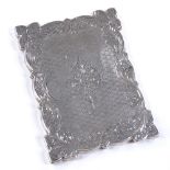 A Victorian rectangular silver card case, with engraved foliate and engine turned decoration, by