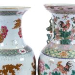 2 similar Chinese porcelain vases with hand painted decoration, height 43cm, late 19th/early 20th