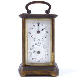 A 19th century brass 8-day carriage clock, with enamel dial and secondary calendar dial, case height