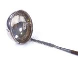 A Georgian silver toddy ladle, with twisted whale bone handle, maker's marks WS, length 31cm