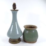 A Chinese Longquan celadon glaze table lamp, with brass mounts, height excluding fitting 34cm, and a