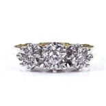 An 18ct gold diamond trilogy ring, with illusion settings, setting height 6.7mm, size P, 3.9g
