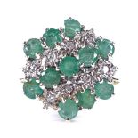 A 9ct gold emerald and diamond cluster ring, setting height 16.4mm, size I, 2.8g