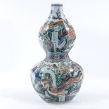 A Chinese famille vert double gourd vase of octagonal form, hand painted exotic birds, height 40cm