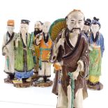 8 Chinese pottery standing figures, height 25cm