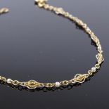 A French 18ct gold platinum and pearl bracelet, bracelet length 20cm, 1.9g