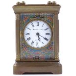 WITHDRAWN A brass and champleve enamel-cased miniature carriage clock, enamel dial signed...