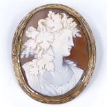 A Victorian relief carved shell cameo panel brooch, depicting Classical female portrait, in unmarked
