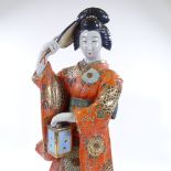 A Japanese porcelain standing figure, height 60cm
