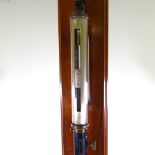 A brass-mounted cylindrical metal ship's stick barometer, with cylindrical glass top, by