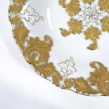 A Meissen relief moulded and gilded porcelain bowl, diameter 28cm