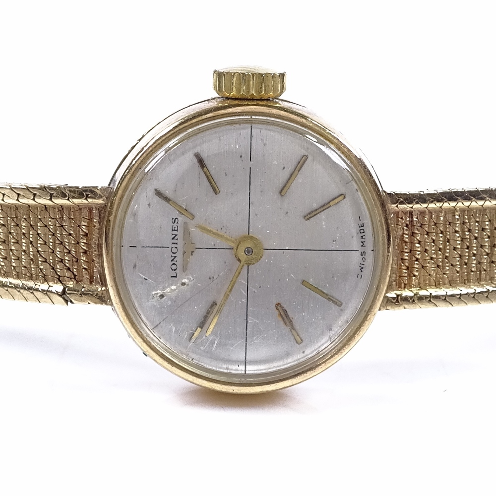 LONGINES - a lady's Vintage 9ct gold wristwatch, 17 jewel mechanical movement, with silvered