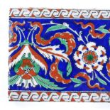 A Turkish Islamic pottery tile, 21cm x 12cm