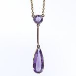 An Edwardian 9ct gold amethyst drop pendant necklace, set with long pear-cut and round mixed-cut