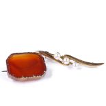 A miniature octagonal carnelian panel brooch, in unmarked yellow metal frame, length 23.8mm,