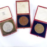 3 leather-cased commemorative coins