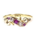 An 18ct gold 5-stone ruby and diamond dress ring, with pierced settings, setting height 5.7mm,