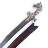 An Indian curved sword, with horsehead design hilt and lion and buffalo design grips, plain curved