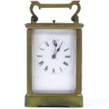 A French 8-day brass-cased carriage clock, striking on a gong, case height 13cm