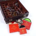 A Vintage Leica leather camera case, 29cm x 32cm, containing 3 original Leica filters