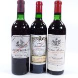 A bottle of Chateau Montrose St Estephe 1969, a bottle of Chateau Beychevelle Saint Julien 1969, a