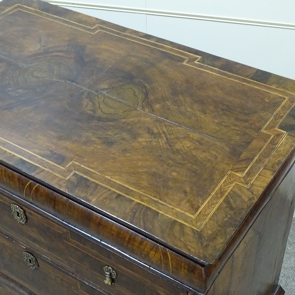 An 18th century walnut chest of 3 long drawers, with feather-banded and quarter veneered top, - Image 2 of 4