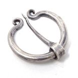Silver penannular brooch of plain form with scrolled terminals, hallmarked London 1961