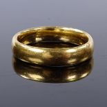 A 22ct gold wedding band ring, maker's marks A and W, hallmarks Birmingham 1918, band width 4.2mm,