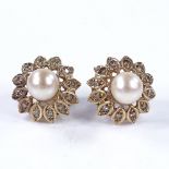 A pair of 9ct gold pearl and diamond cluster earrings, with stud fittings, earring diameter 1.